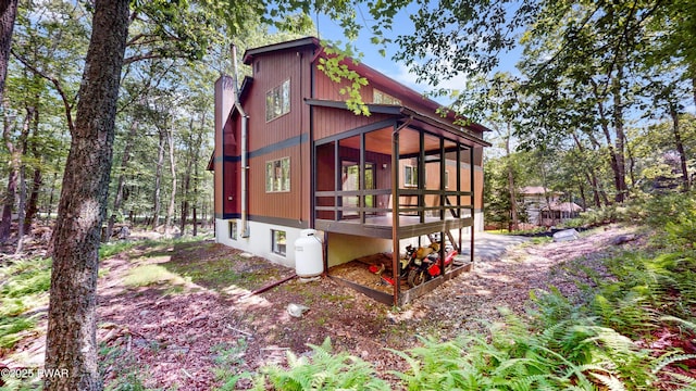 158 Wild Meadow Dr, Milford, PA 18337 - view of home's exterior with a sunroom