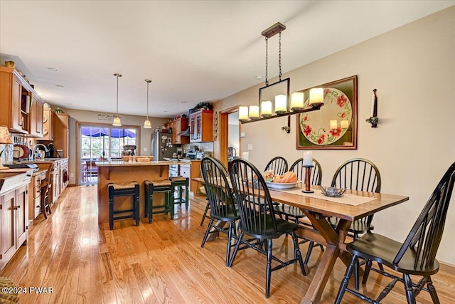 dining room featuring light wood-type flooring