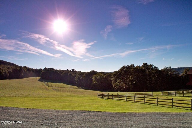 exterior space featuring a rural view