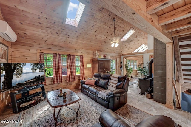 8 Brentwood Ct Lot 1019, Lake Ariel, PA 18436 - living area featuring a skylight, a wood stove, healthy amount of natural light, wooden walls, and a wall mounted AC