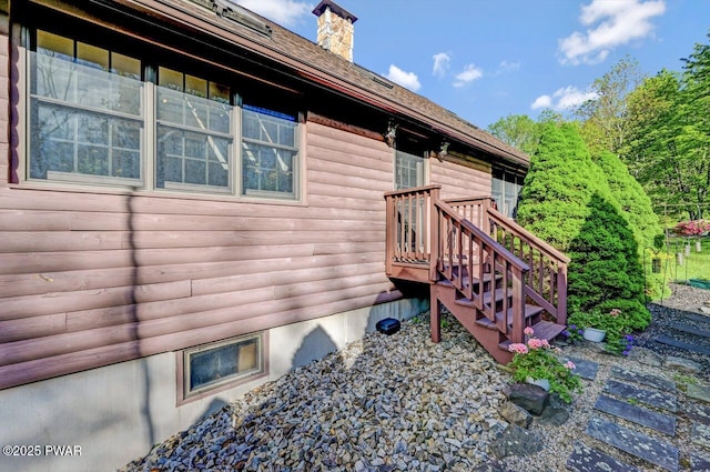 8 Brentwood Ct Lot 1019, Lake Ariel, PA 18436 - view of home's exterior with a chimney and log veneer siding