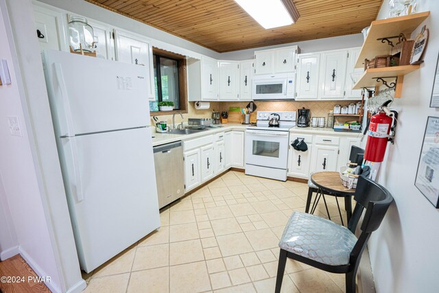 kitchen featuring tasteful backsplash, wood ceiling, white appliances, white cabinetry, and light tile patterned flooring