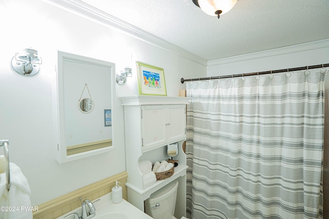 bathroom featuring sink, ornamental molding, a textured ceiling, toilet, and a shower with shower curtain