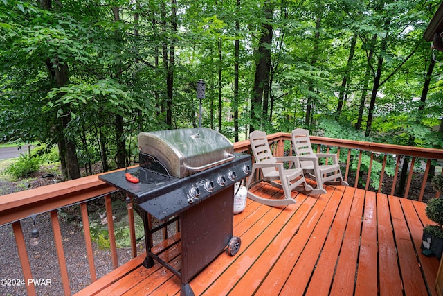 wooden terrace with grilling area