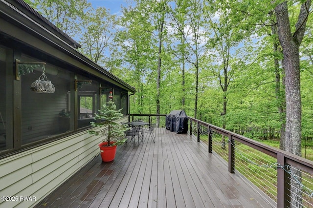 105 Chestnut Ct, Lackawaxen, PA 18435 - wooden deck featuring outdoor dining space and a grill