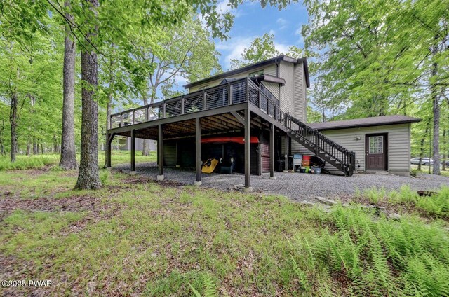 105 Chestnut Ct, Lackawaxen, PA 18435 - rear view of property featuring a wooden deck and stairs