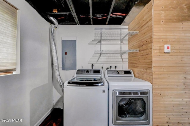 105 Chestnut Ct, Lackawaxen, PA 18435 - laundry room featuring independent washer and dryer, electric panel, wooden walls, and baseboards