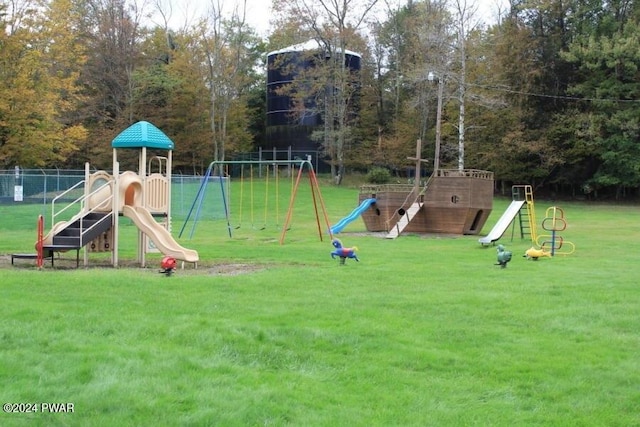 view of play area with a yard