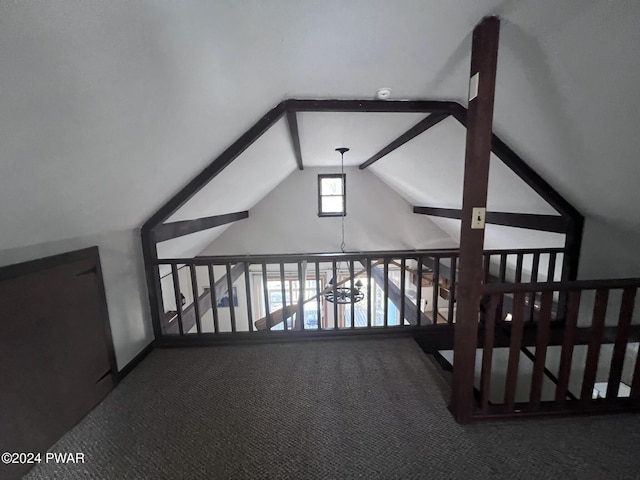 bonus room featuring carpet floors and vaulted ceiling