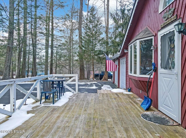 view of snow covered deck