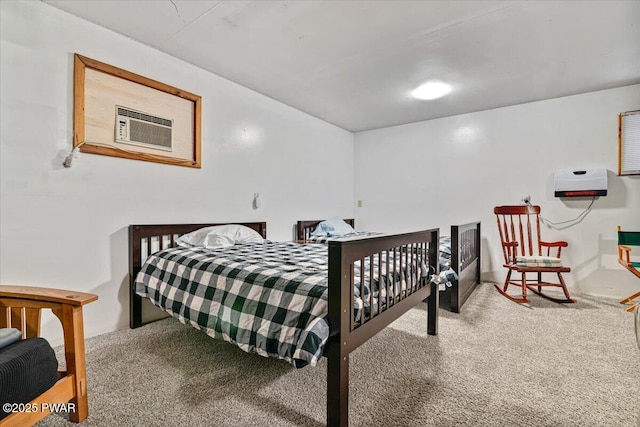 carpeted bedroom featuring a wall mounted AC