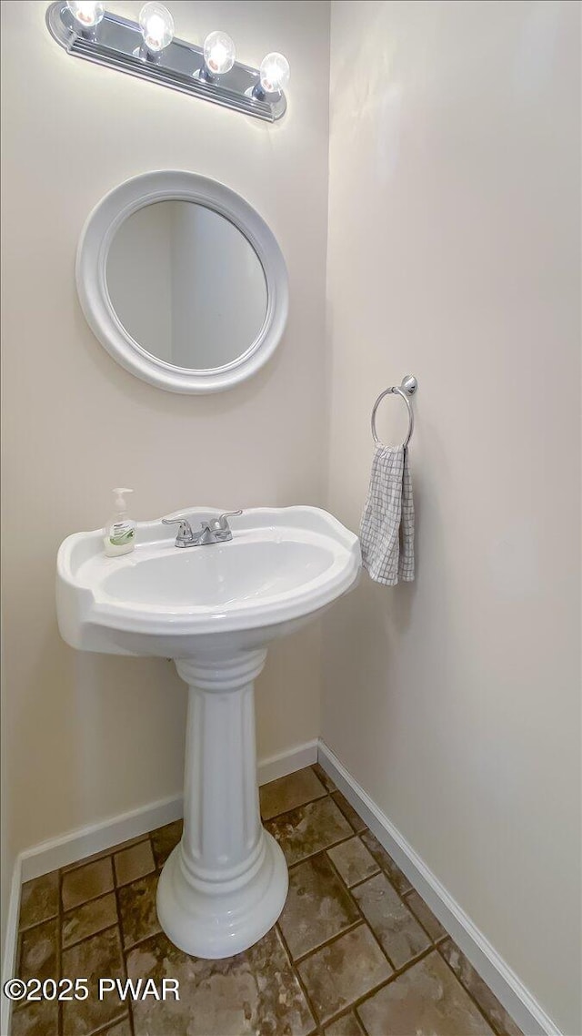 bathroom with baseboards