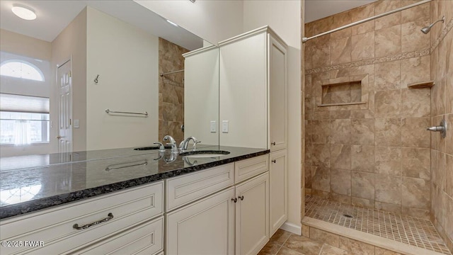 full bath with vanity and walk in shower