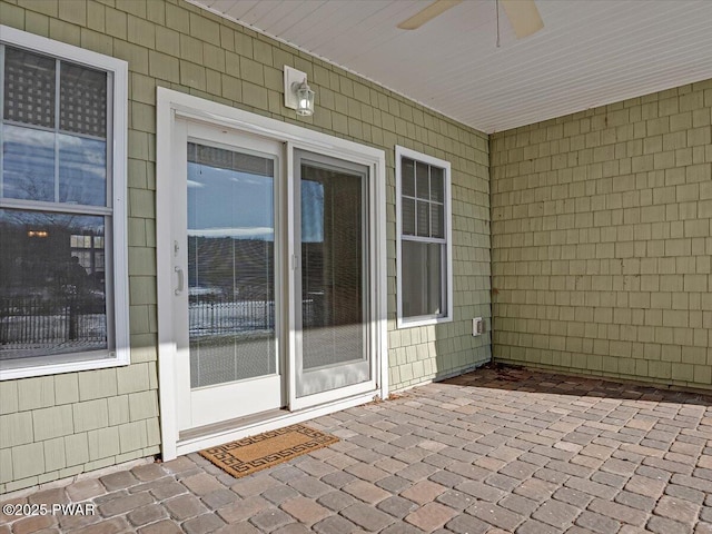 view of patio featuring a ceiling fan