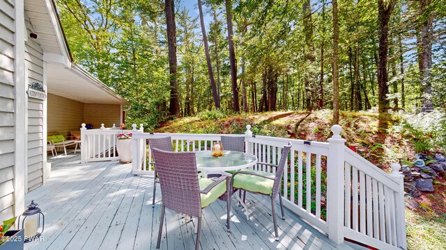 785 Milford Rd, Dingmans Ferry, PA 18328 - wooden deck featuring outdoor dining area