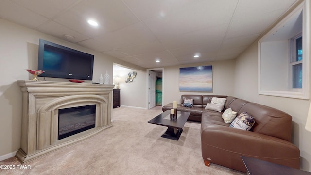 785 Milford Rd, Dingmans Ferry, PA 18328 - carpeted living room featuring a paneled ceiling, a glass covered fireplace, and recessed lighting