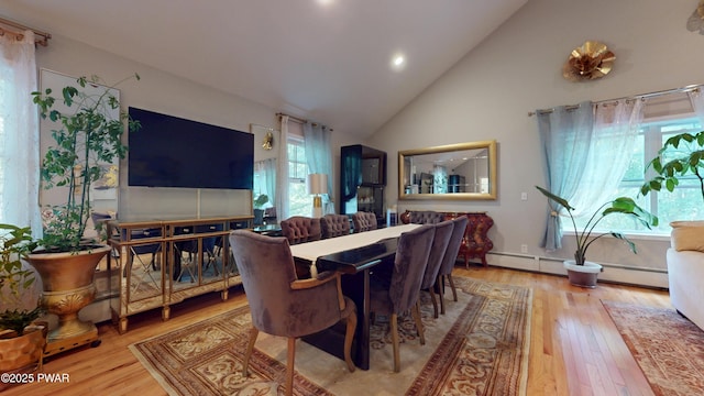 785 Milford Rd, Dingmans Ferry, PA 18328 - dining area with wood finished floors, recessed lighting, and high vaulted ceiling