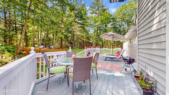 785 Milford Rd, Dingmans Ferry, PA 18328 - wooden deck featuring outdoor dining area and view of scattered trees