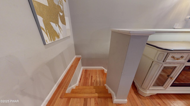 785 Milford Rd, Dingmans Ferry, PA 18328 - stairs featuring wood finished floors and baseboards