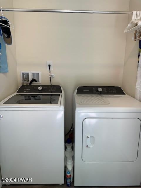 laundry area featuring separate washer and dryer