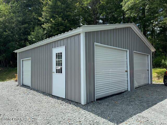 view of outdoor structure featuring a garage