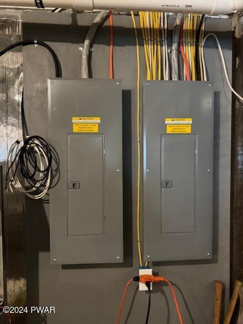 utility room featuring electric panel