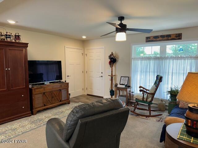 living room featuring ceiling fan