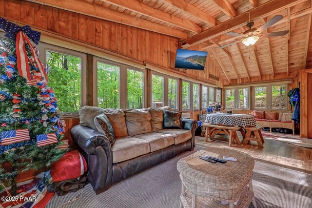 25 Deerfoot Rd, Lake Ariel, PA 18436 - living area featuring wood ceiling, wood walls, a ceiling fan, and hardwood / wood-style floors