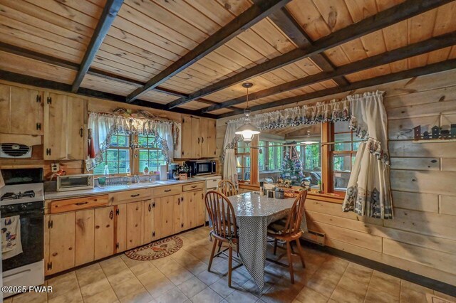 25 Deerfoot Rd, Lake Ariel, PA 18436 - kitchen with gas range, wooden ceiling, light brown cabinetry, beamed ceiling, and stainless steel microwave
