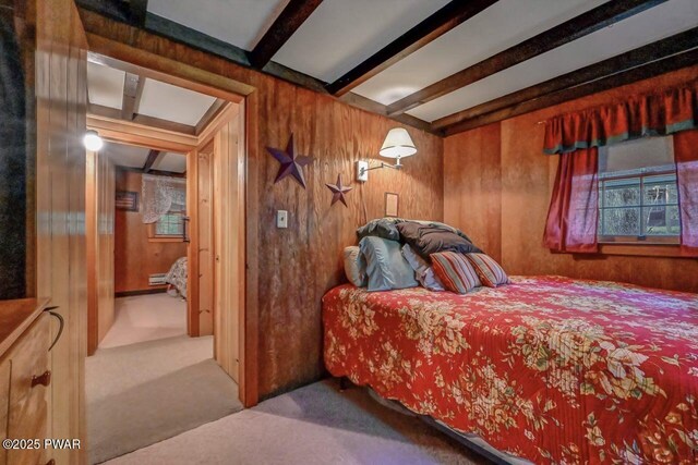 25 Deerfoot Rd, Lake Ariel, PA 18436 - carpeted bedroom with beam ceiling and wood walls