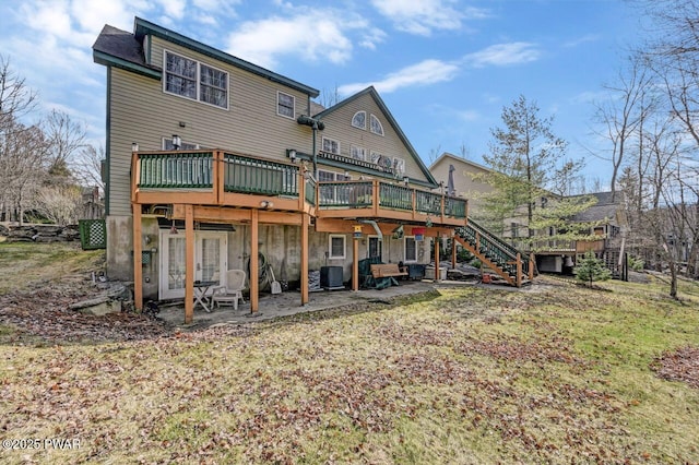 back of property with central AC unit, stairway, a deck, and a patio