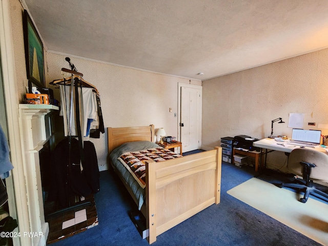 carpeted bedroom with a textured ceiling