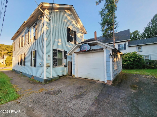 exterior space featuring a garage