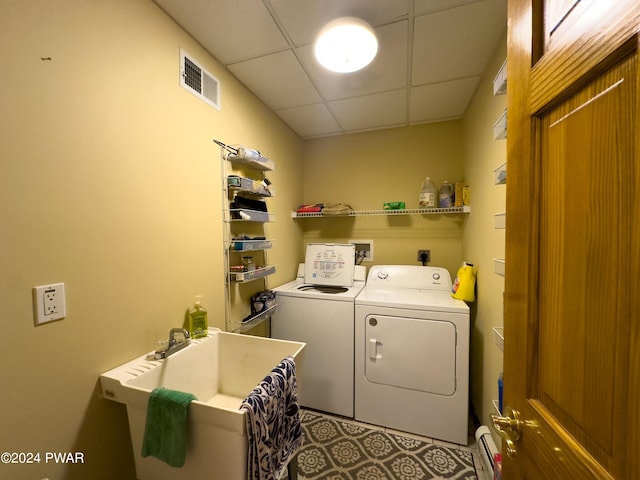 washroom with washer and dryer