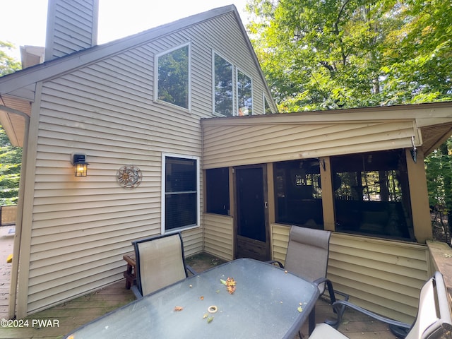 exterior space with a sunroom