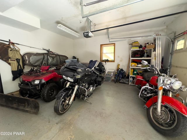 garage featuring a garage door opener