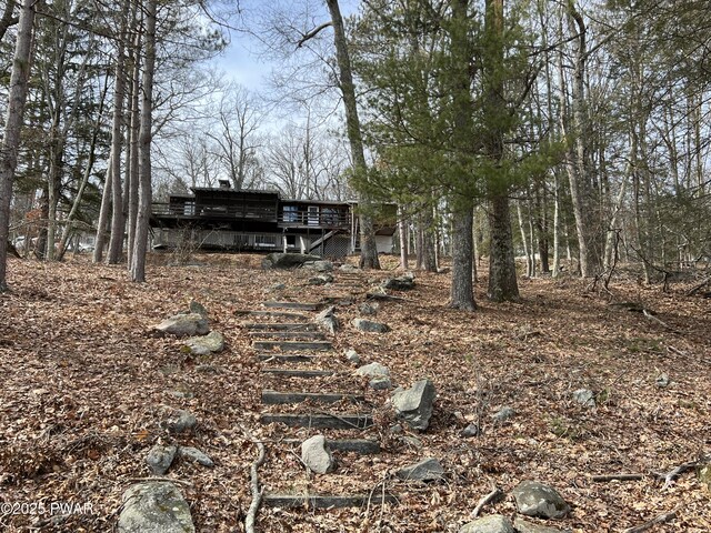 129 Waterview Dr, Lords Valley, PA 18428 - view of yard featuring stairs and a deck