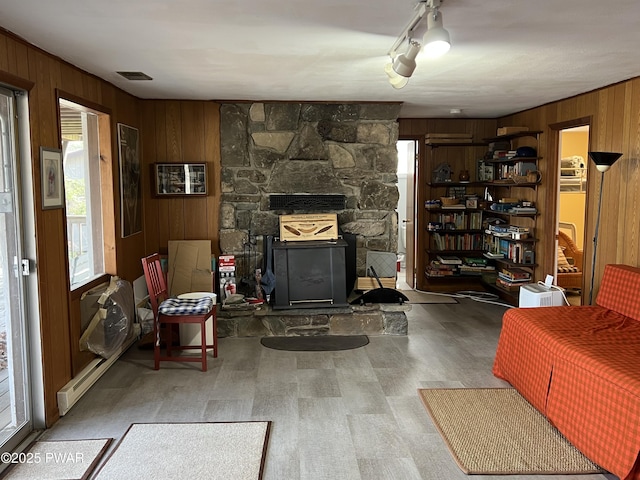 129 Waterview Dr, Lords Valley, PA 18428 - living area featuring wooden walls, wood finished floors, and a wealth of natural light