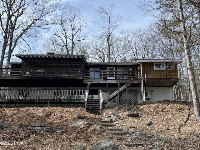 129 Waterview Dr, Lords Valley, PA 18428 - back of house featuring a wooden deck and stairway