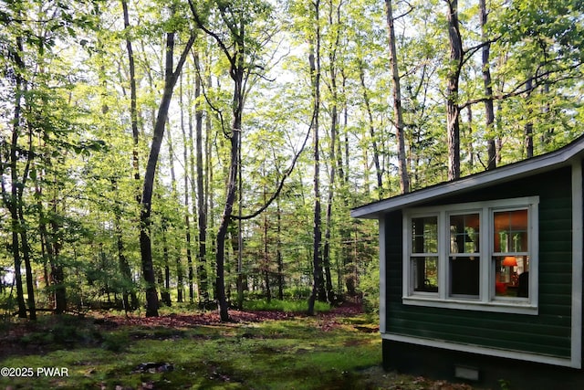 138 Lake Minisink Rd E, Dingmans Ferry, PA 18328 - view of property exterior with a forest view
