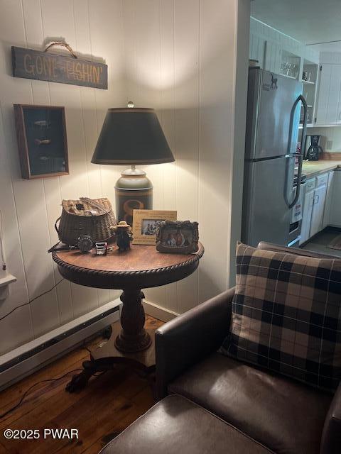 138 Lake Minisink Rd E, Dingmans Ferry, PA 18328 - dining room with wood finished floors and a decorative wall