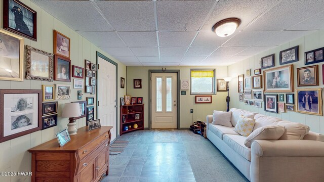 163 Wild Acres Dr, Dingmans Ferry, PA 18328 - living room featuring a drop ceiling and tile patterned floors