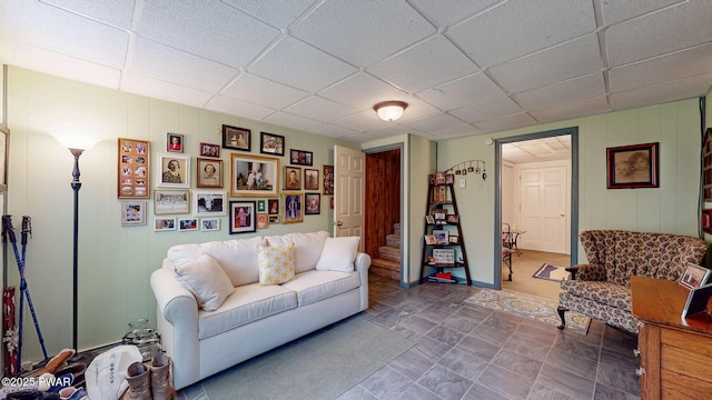 163 Wild Acres Dr, Dingmans Ferry, PA 18328 - living room featuring a drop ceiling and stairway