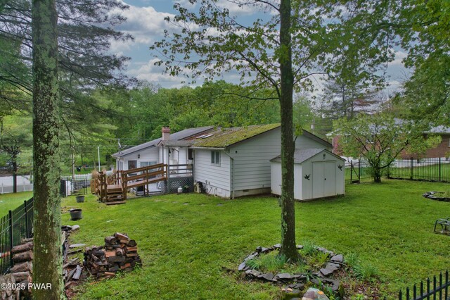 163 Wild Acres Dr, Dingmans Ferry, PA 18328 - rear view of property with a chimney, a deck, crawl space, and a shingled roof