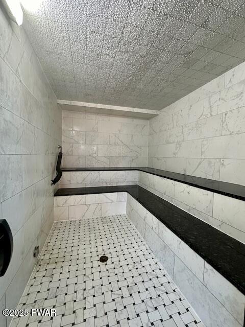 120 Burning Tree Dr, Lords Valley, PA 18428 - bathroom featuring a tile shower