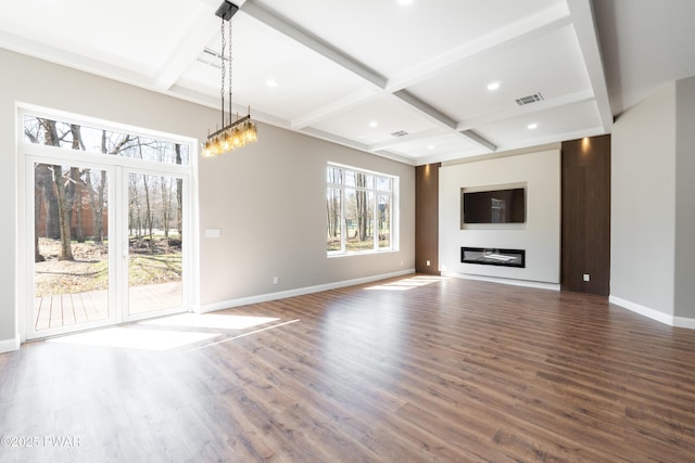 unfurnished living room with visible vents, baseboards, coffered ceiling, beamed ceiling, and wood finished floors