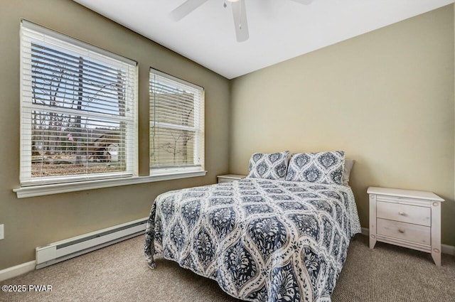 102 Oriole Pl, Lackawaxen, PA 18435 - bedroom with a baseboard radiator, baseboards, a ceiling fan, and carpet