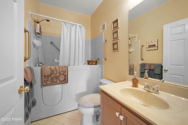 bathroom featuring tile patterned flooring, vanity, toilet, shower / bath combo with shower curtain, and visible vents
