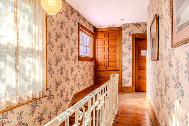 hallway featuring hardwood / wood-style flooring