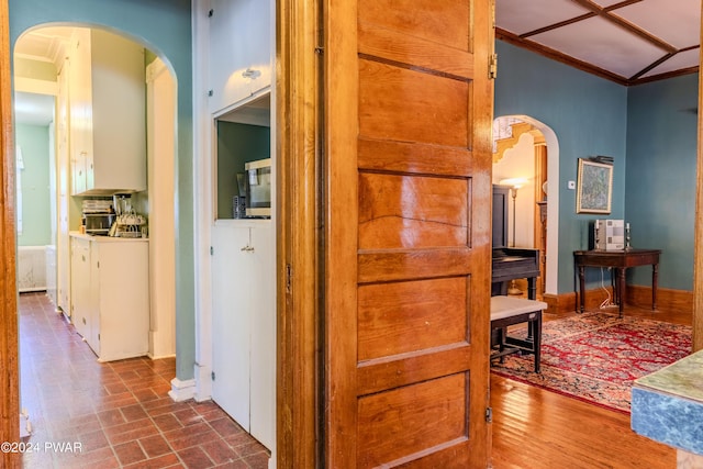 hallway with crown molding